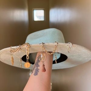 Blue/green suede hat made in Mexico with charms.